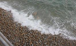 海浪沖攤圖片