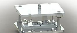 與杠桿機構和雜志的沖壓模具
