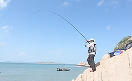 海景垂釣圖片