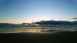 日落,俄勒岡州的海灘,云
