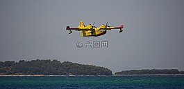 飛機,海,火