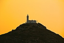 燈塔,黃色的天空,日落