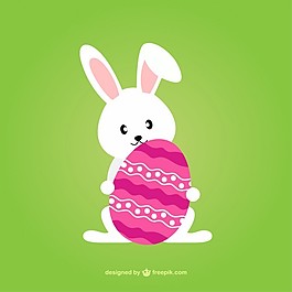 可愛的復(fù)活節(jié)兔子與裝飾的雞蛋