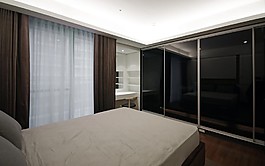 現(xiàn)代極簡臥室黑色背景墻室內(nèi)裝修效果圖