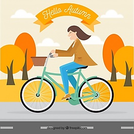 在一個(gè)秋天的景觀自行車女子背景