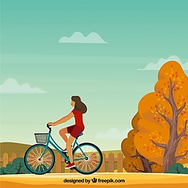 有自行車和秋天風(fēng)景的女人
