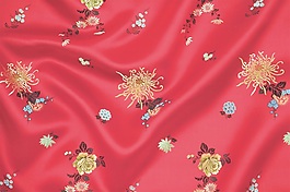 紅色喜慶刺繡褶皺布料背景素材填充背景