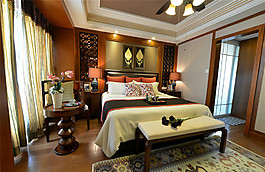 中式時(shí)尚臥室褐色木制背景墻室內(nèi)裝修效果圖