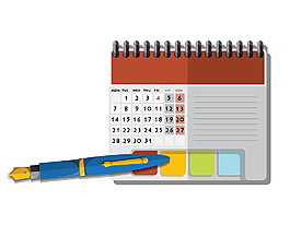迷你笔记本上的日历与钢笔