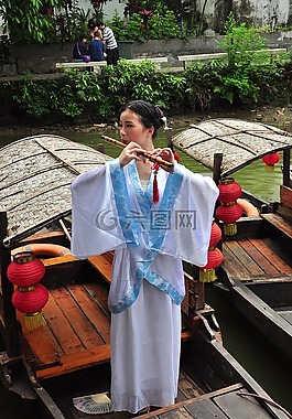 中国的女人,中国的长笛的女人,中国女人在船上