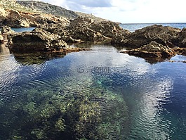 green,rock,sea