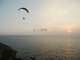 飛翔,夕陽,海