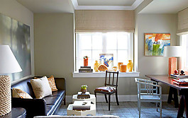 现代客厅兼书房真皮沙发装修效果图