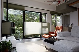 现代森系客厅橙色躺椅室内装修效果图