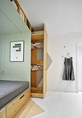 现代卧室淡绿色背景墙室内装修效果图